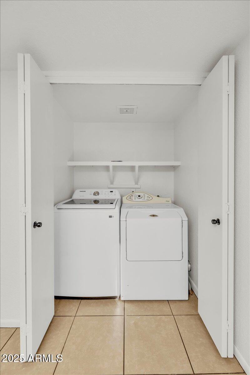 2437 East Tracy Lane, Unit 2 Phoenix, AZ 85032 - Photo 23 of 30 a utility room with washer and dryer