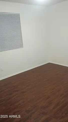 a bathroom with a sink a toilet and a shower