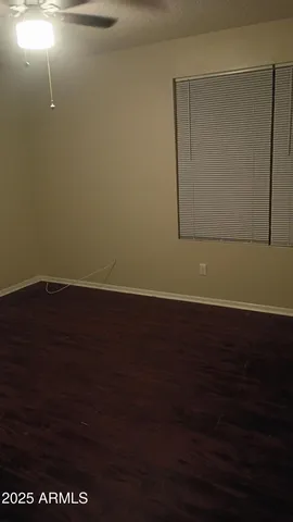 a kitchen with granite countertop white cabinets white stainless steel appliances with a sink and dishwasher
