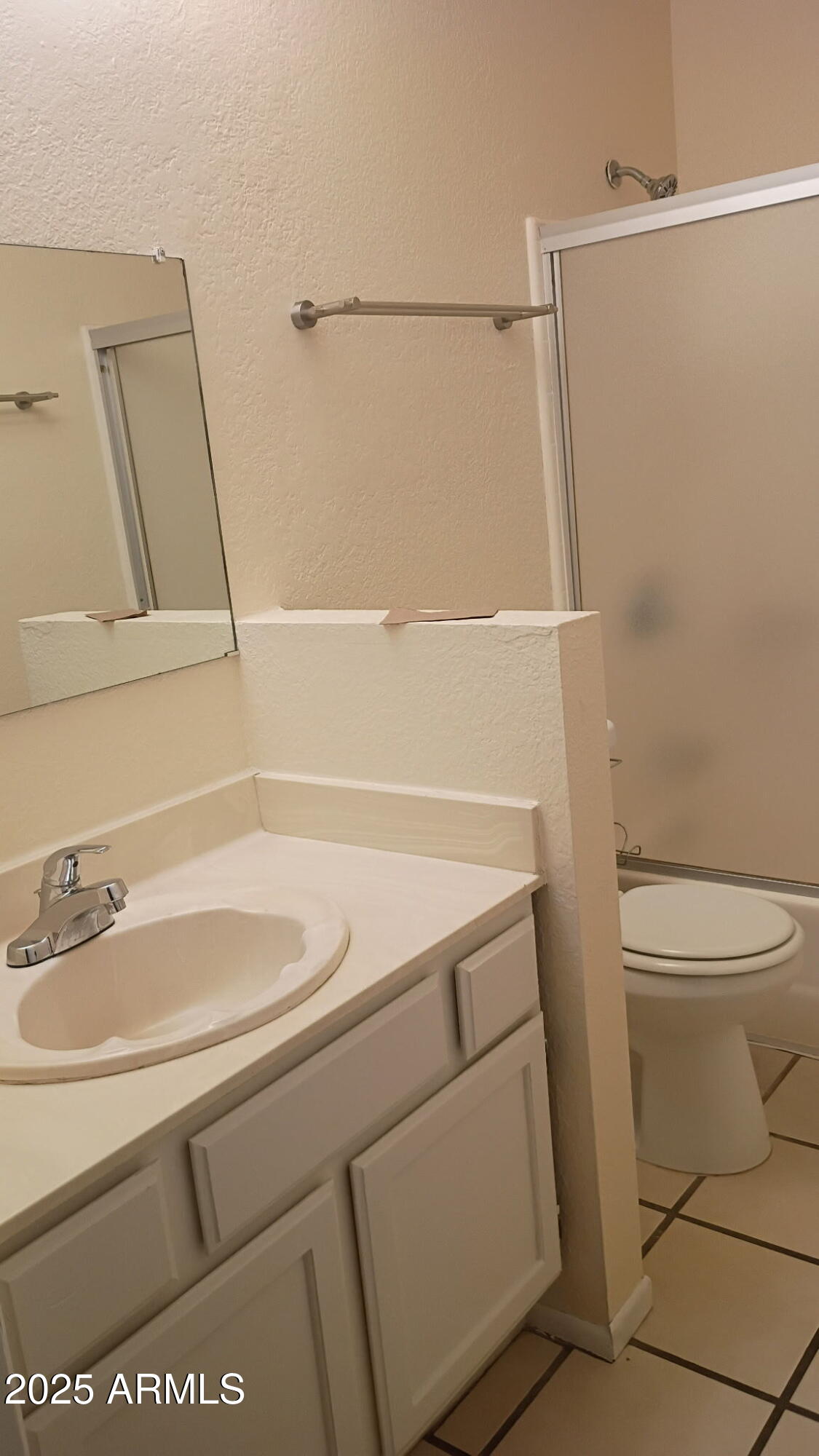 2437 East Tracy Lane, Unit 2 Phoenix, AZ 85032 - Photo 9 of 30 a bathroom with a sink a toilet and a shower