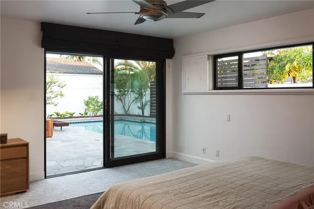 a view of a bedroom with a large window