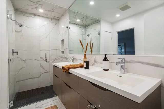 a view of a sink and a mirror