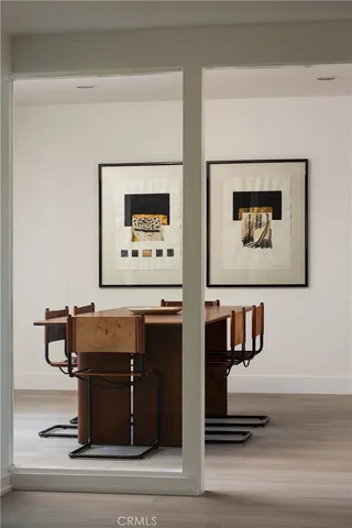 a room with furniture and mirror