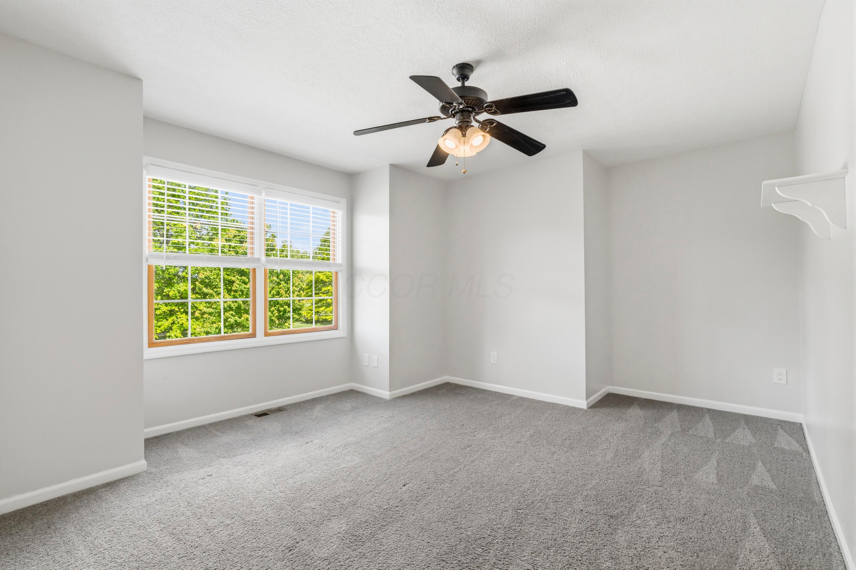8507 Benner Road Johnstown, OH 43031 - Photo 39 of 69 Large Bedroom #3 with ceiling fan and NEW Carpet!