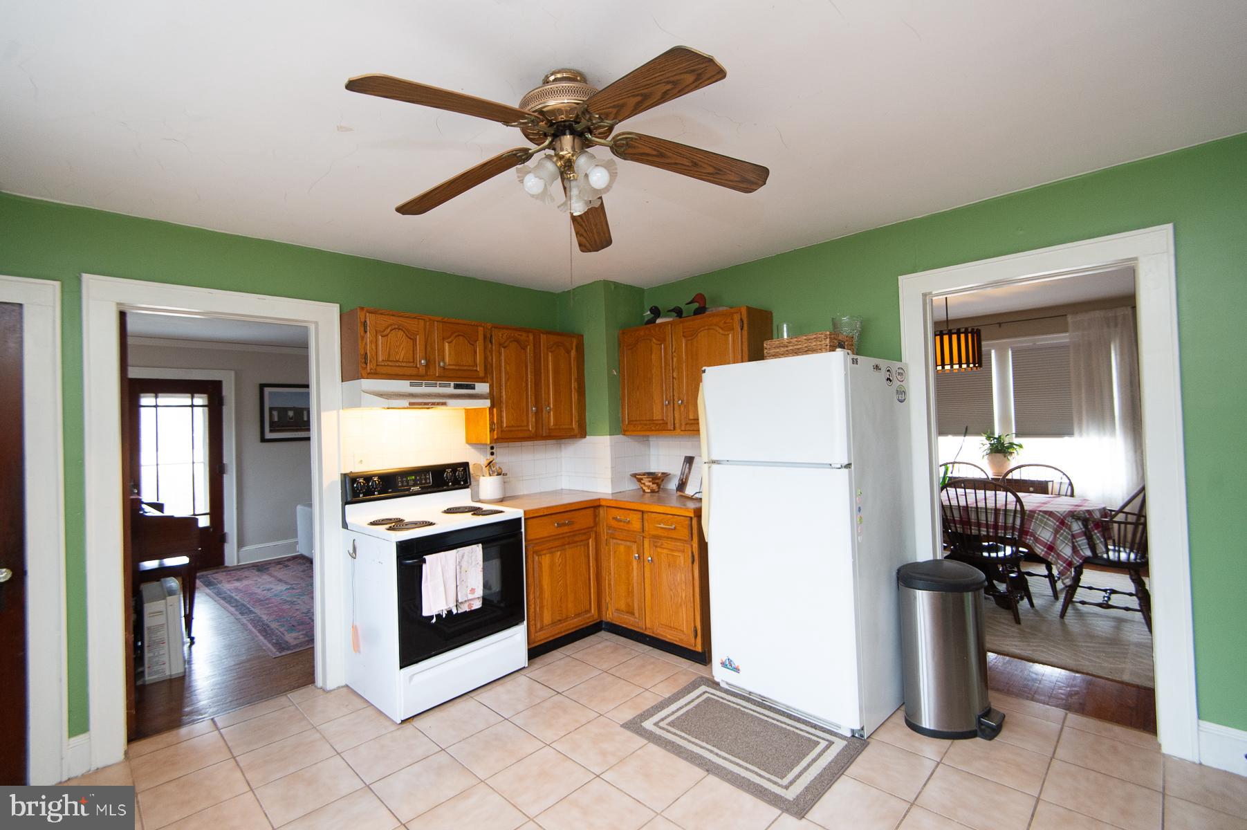 3755 Sunnyside Road East New Market, MD 21631 - Photo 12 of 37 a kitchen with a refrigerator a stove top oven a sink and dishwasher