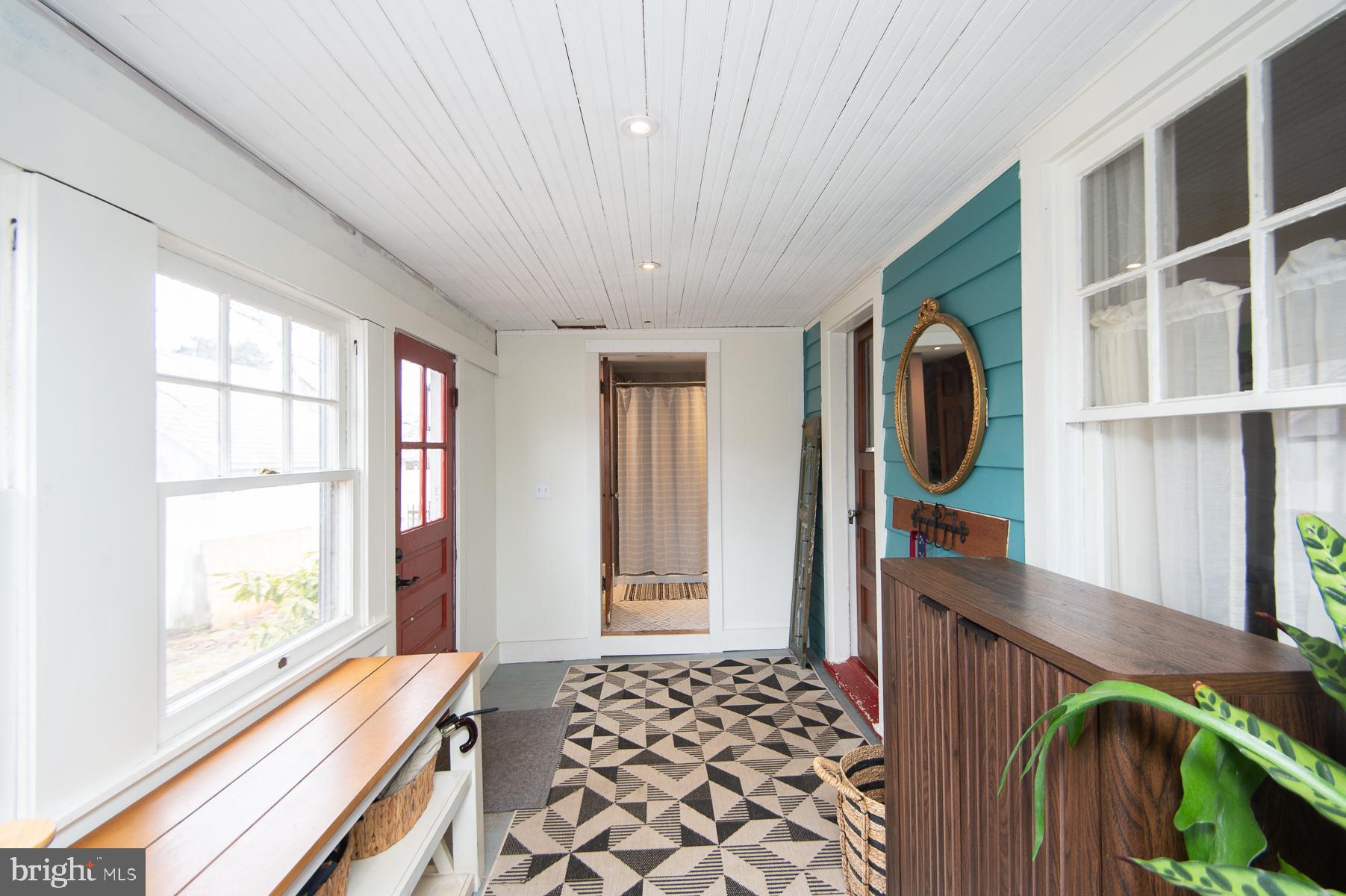 3755 Sunnyside Road East New Market, MD 21631 - Photo 15 of 37 a view of a hallway with wooden floor and windows