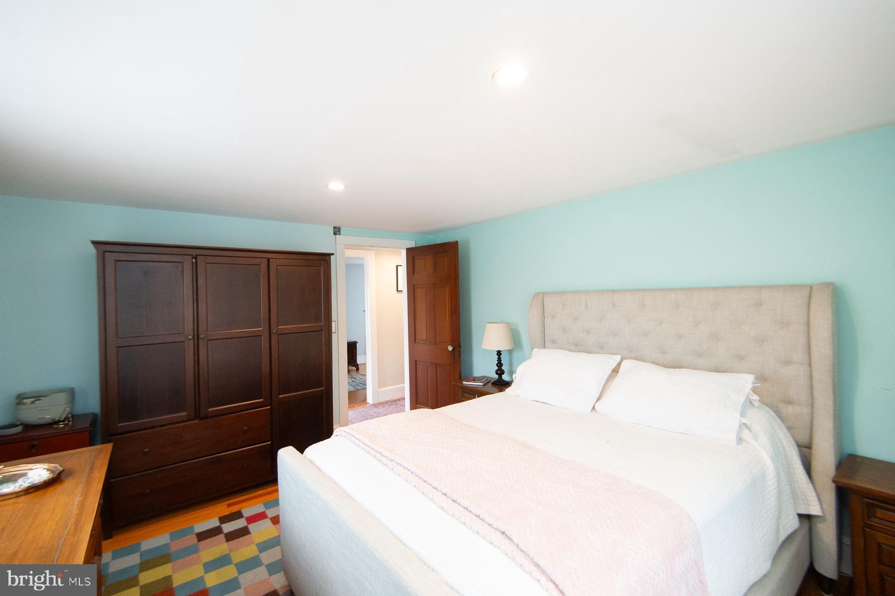 3755 Sunnyside Road East New Market, MD 21631 - Photo 20 of 37 a spacious bedroom with a bed and a shower