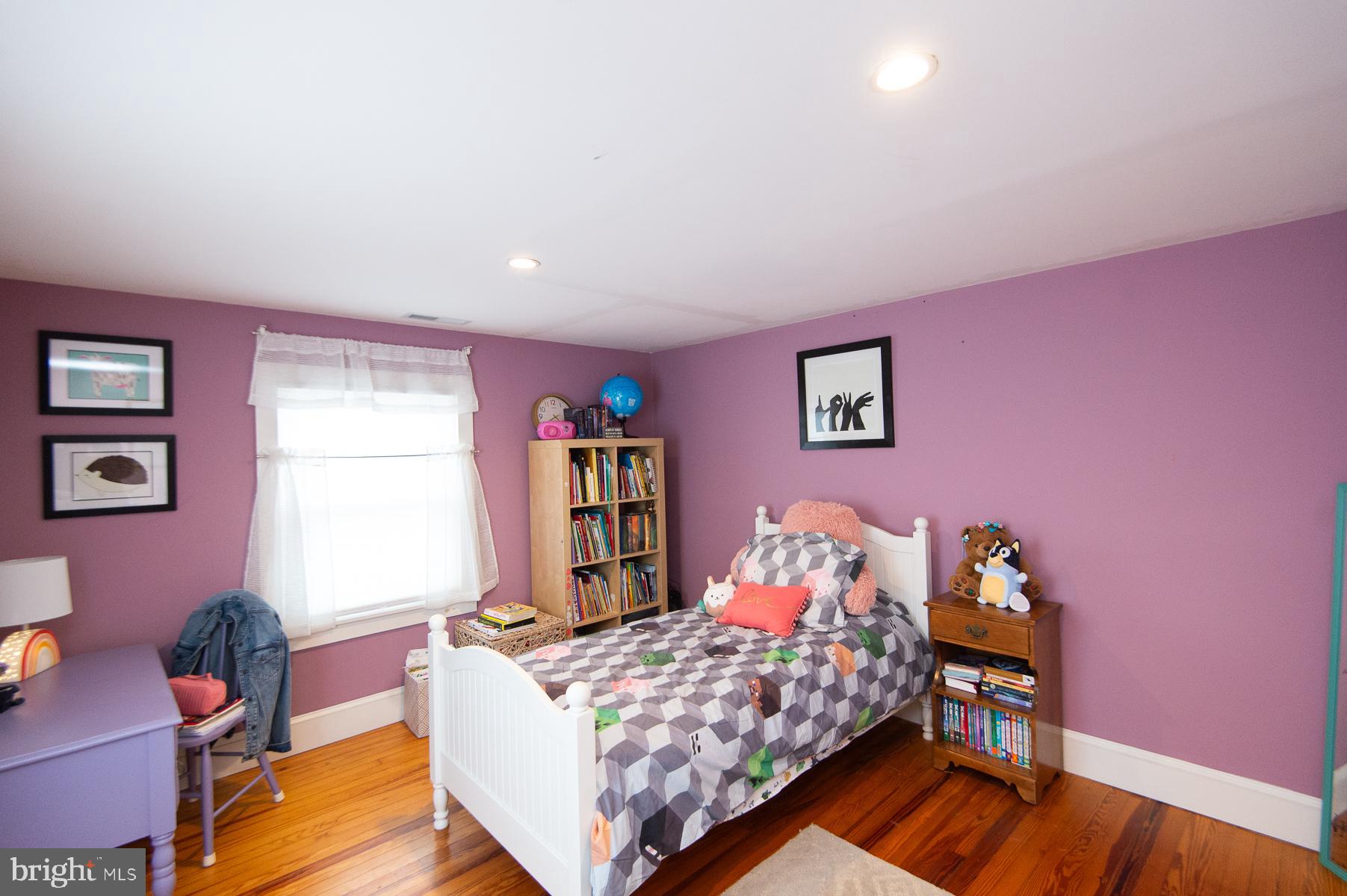 3755 Sunnyside Road East New Market, MD 21631 - Photo 22 of 37 a bedroom with a bed and wooden floor
