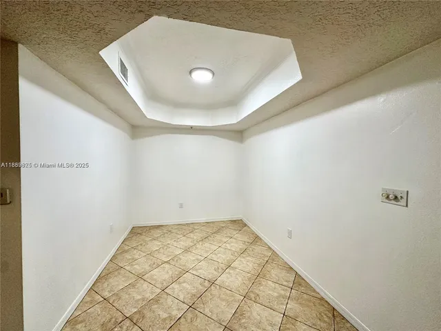 a view of a room with washer and dryer