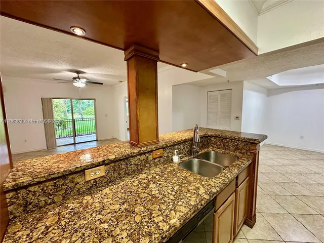 a view of balcony with yard