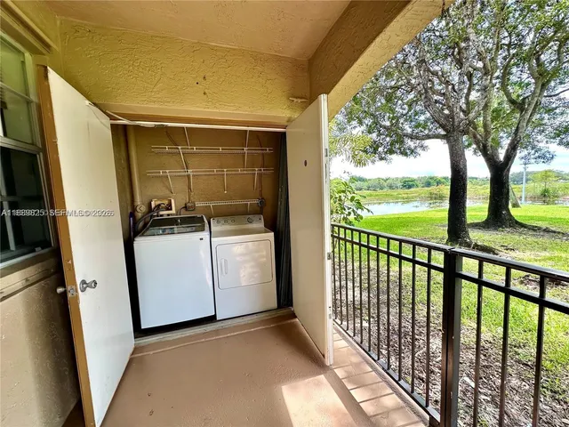 a view of a lake with a yard