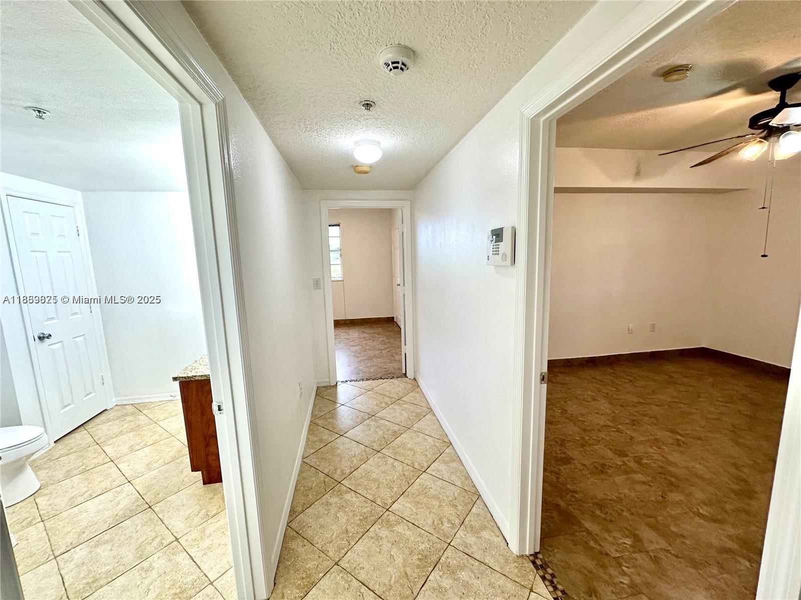 231 Southwest 116th Avenue, Unit 19108 Pembroke Pines, FL 33025 - Photo 24 of 56 a view of a hallway
