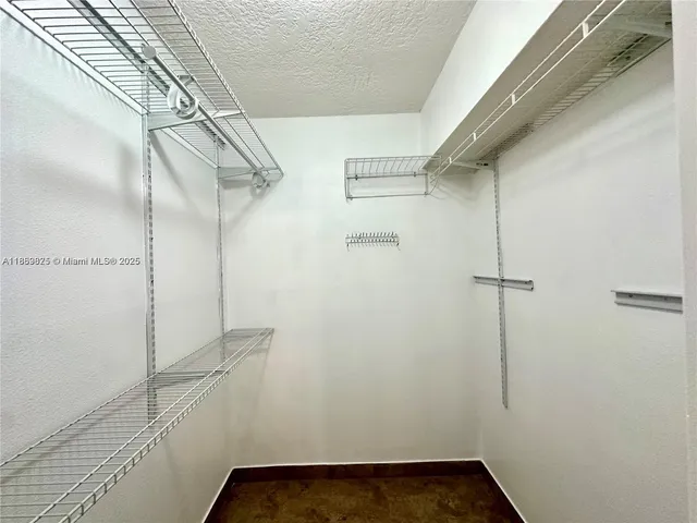 a view of a hallway with a large window