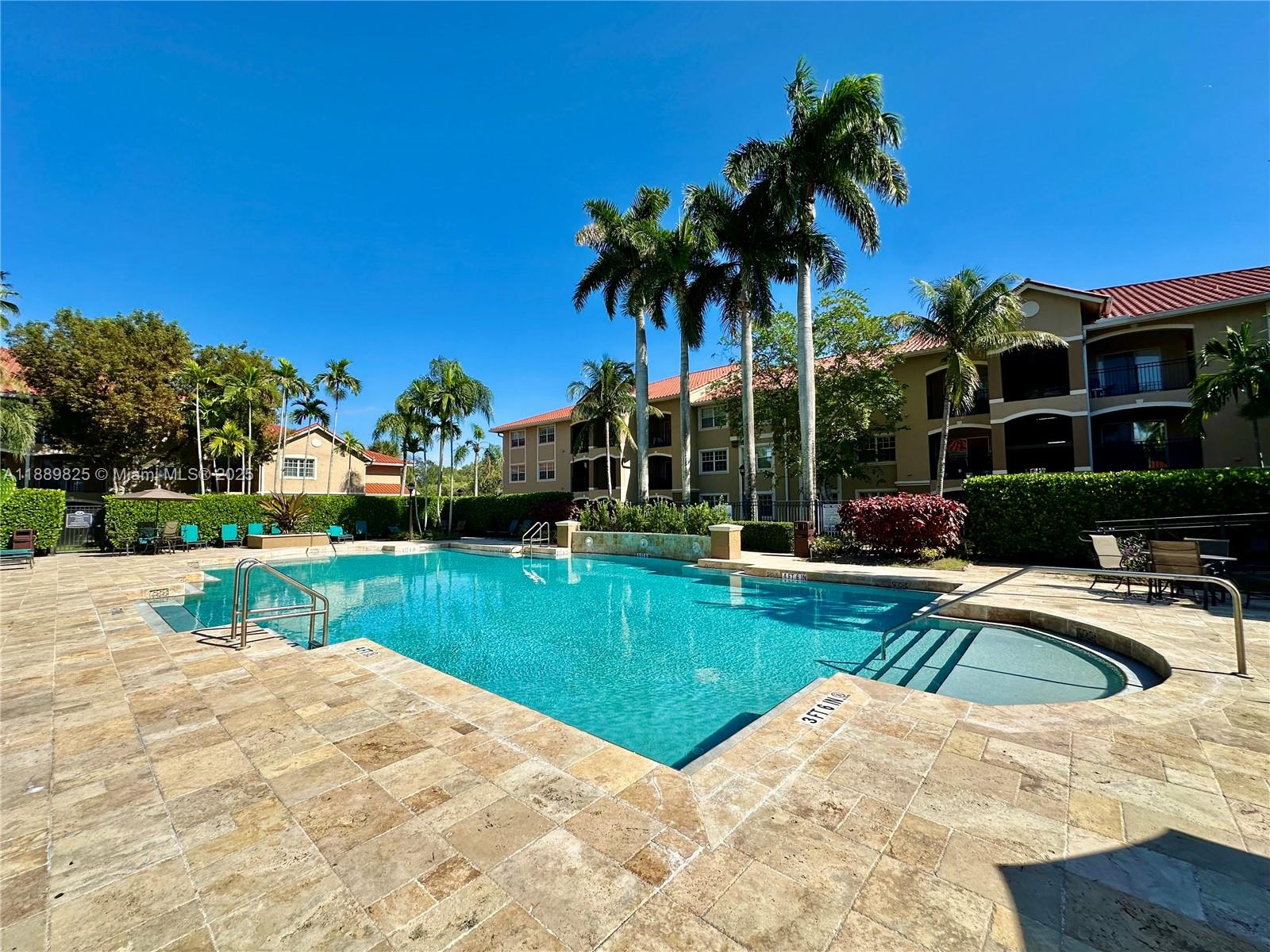 231 Southwest 116th Avenue, Unit 19108 Pembroke Pines, FL 33025 - Photo 37 of 56 a view of a house with swimming pool and sitting area