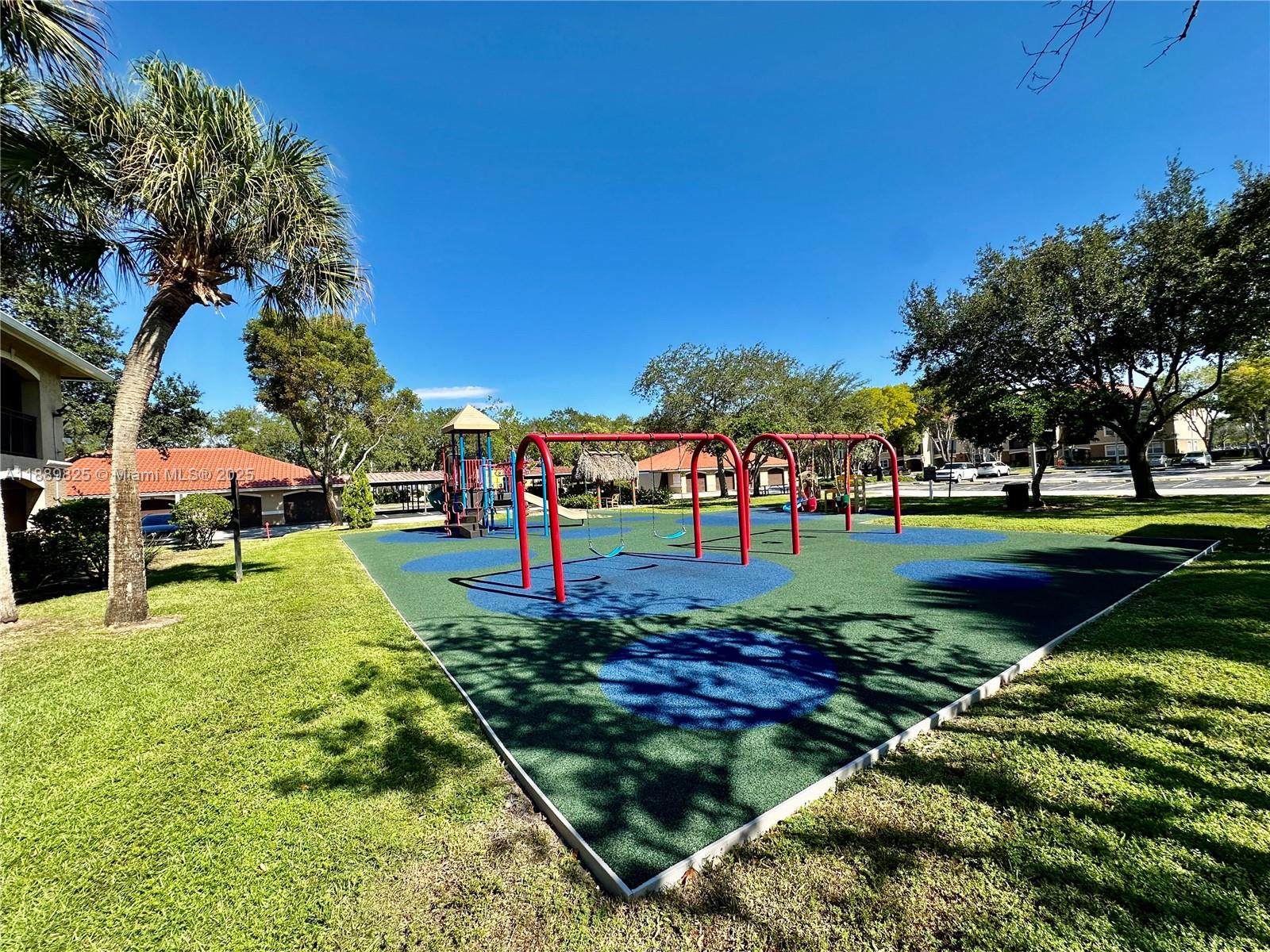 231 Southwest 116th Avenue, Unit 19108 Pembroke Pines, FL 33025 - Photo 40 of 56 a view of a park with large trees