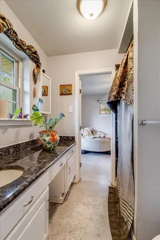 a view of living room and kitchen