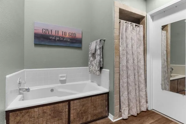 a bathroom with a sink and a bathtub