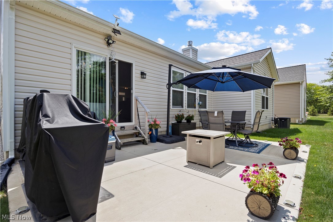 109 West Spring Drive Elyria, OH 44035 - Photo 44 of 46 Spacious concrete patio featuring direct access via sliding glass doors