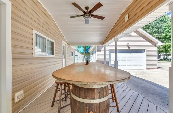 a table and chairs in a patio