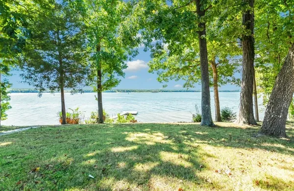 a view of swimming pool with a yard