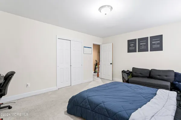 a bedroom with furniture and a couch