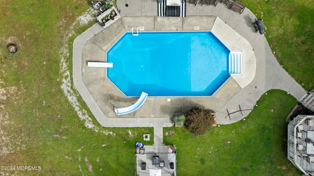 a view of a house with a swimming pool