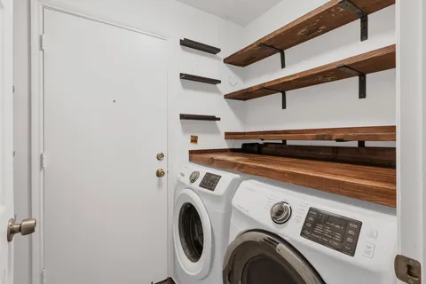 a utility room with dryer and washer