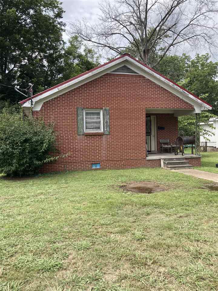 200 Highland Street Ripley, TN 38063 - Photo 1 of 2 a backyard of a house with lots of green space