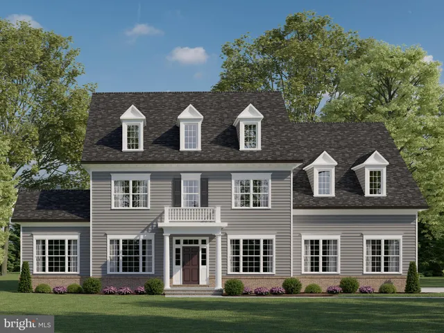 front view of building with a yard