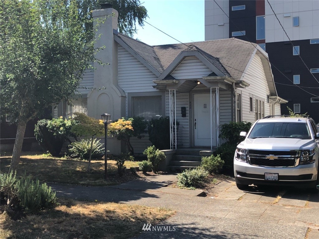 835 Northeast 68th Street Seattle, WA 98115 - Photo 1 of 2 a front view of a house with garden