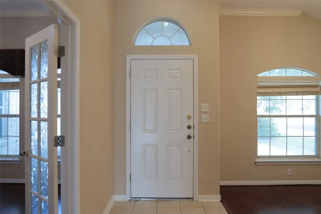 a picture of a bathroom with a shower