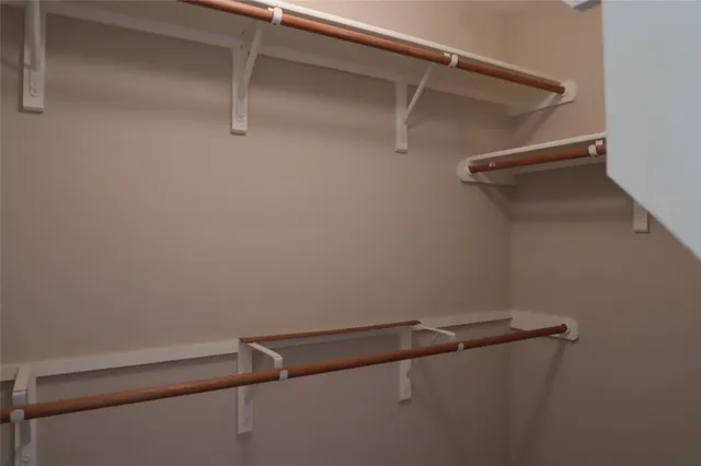 a view of a room with racks on the wall