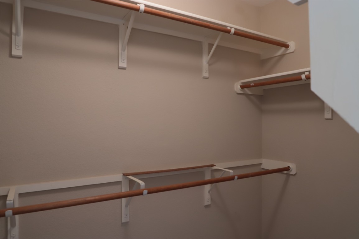 3936 Links Lane Round Rock, TX 78664 - Photo 22 of 40 a view of a room with racks on the wall