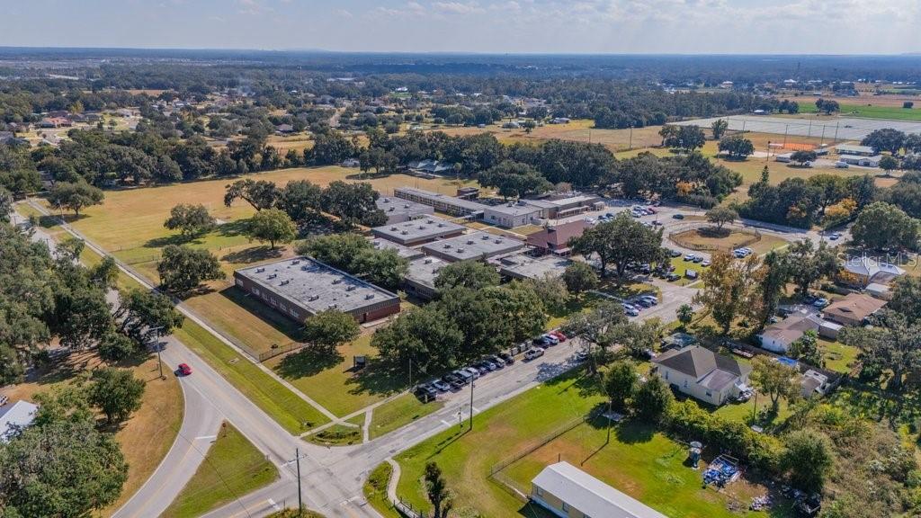 5301 Coronet Road Plant City, FL 33566 - Photo 11 of 38 an aerial view of residential houses with outdoor space
