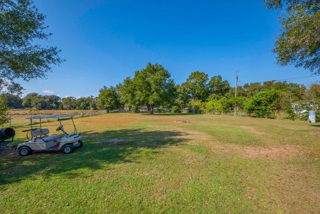 5301 Coronet Road Plant City, FL 33566 - Photo 31 of 38 a view of a lake with houses