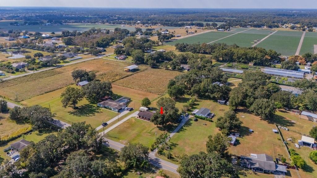 5301 Coronet Road Plant City, FL 33566 - Photo 6 of 38 an aerial view of residential houses with outdoor space
