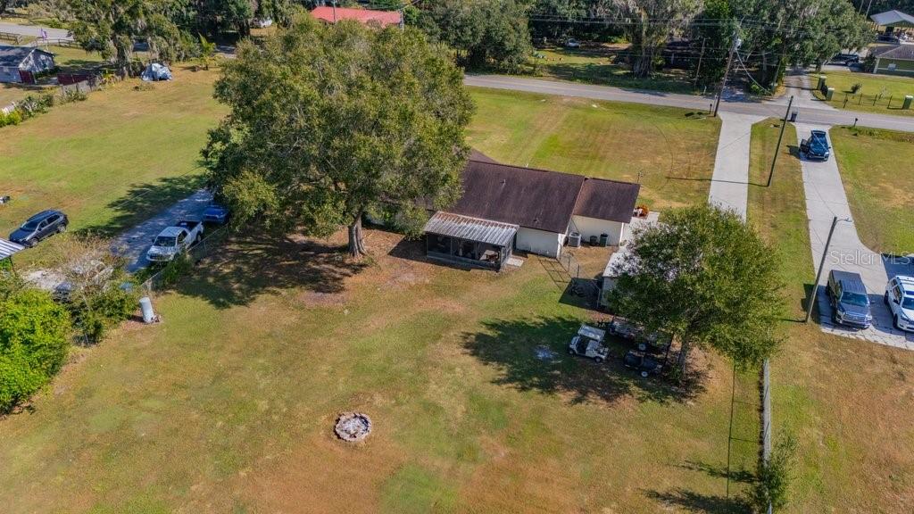 5301 Coronet Road Plant City, FL 33566 - Photo 7 of 38 a view of outdoor space and swimming pool