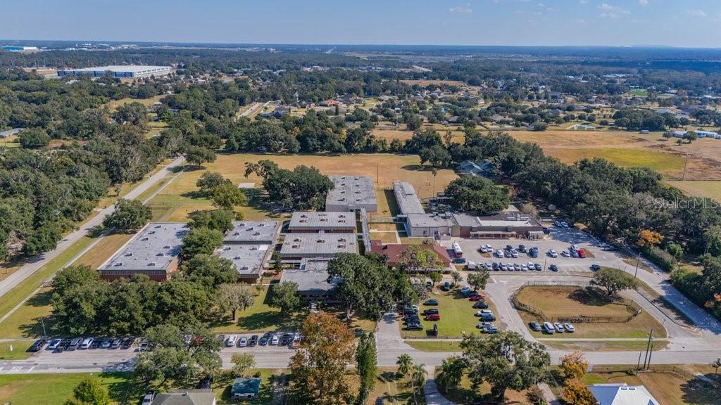 5301 Coronet Road Plant City, FL 33566 - Photo 10 of 38 an aerial view of residential houses with outdoor space