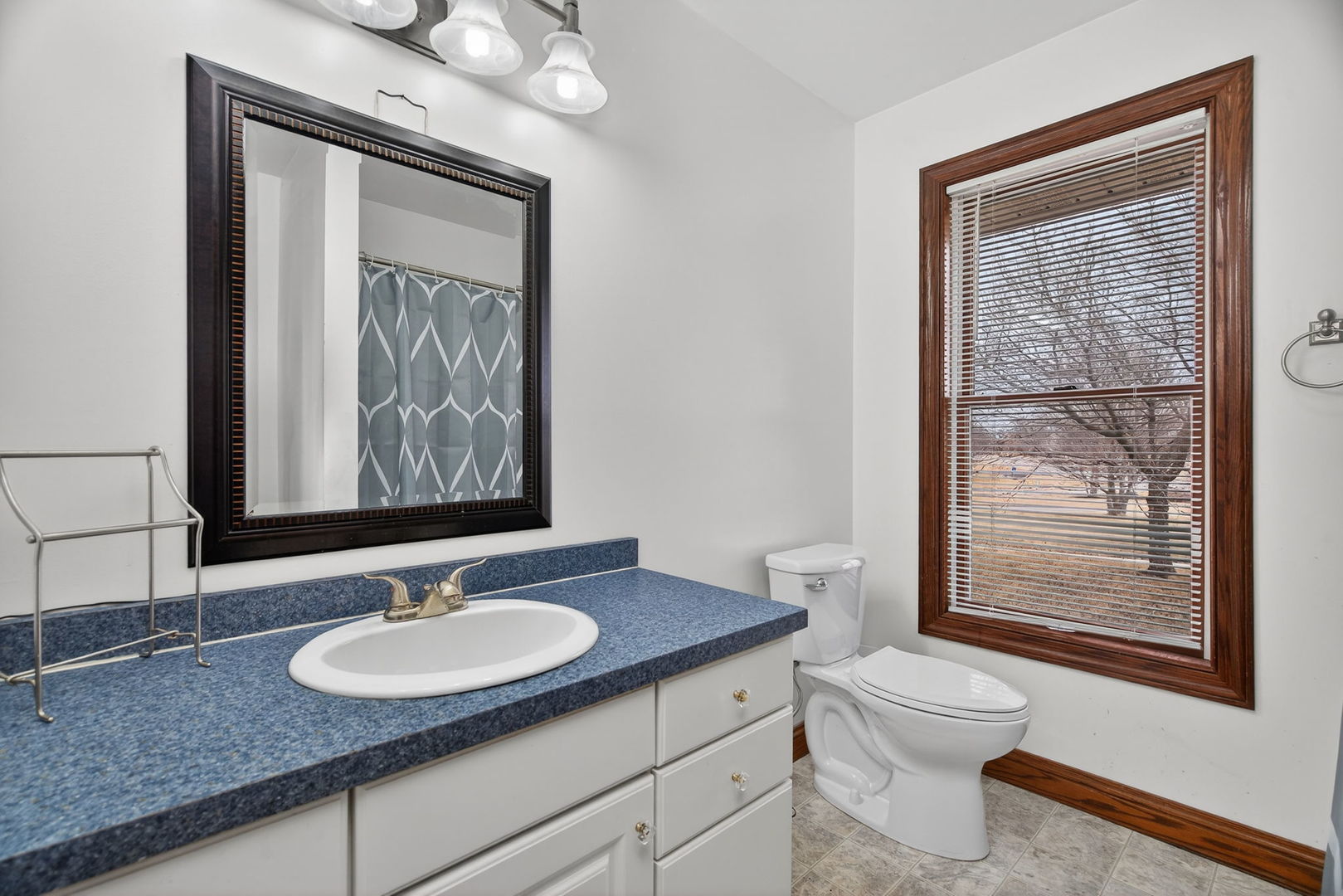 1707 North 2479th Road Ottawa, IL 61350 - Photo 20 of 30 a bathroom with a toilet sink and mirror