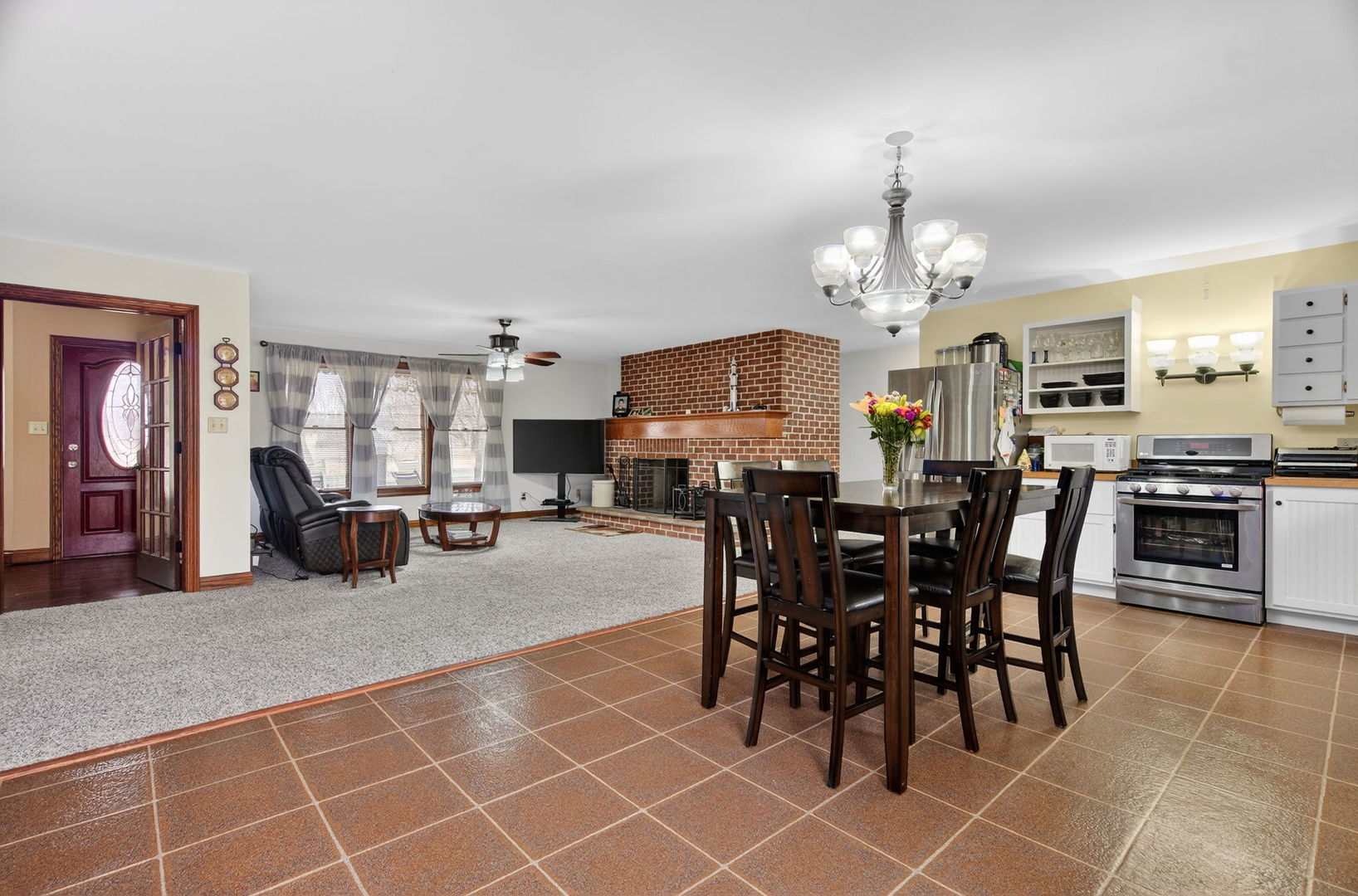 1707 North 2479th Road Ottawa, IL 61350 - Photo 6 of 30 a view of a dining room with furniture and chandelier