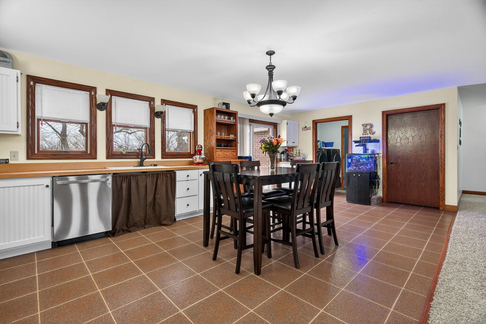 1707 North 2479th Road Ottawa, IL 61350 - Photo 7 of 30 a view of a dining room with furniture and chandelier