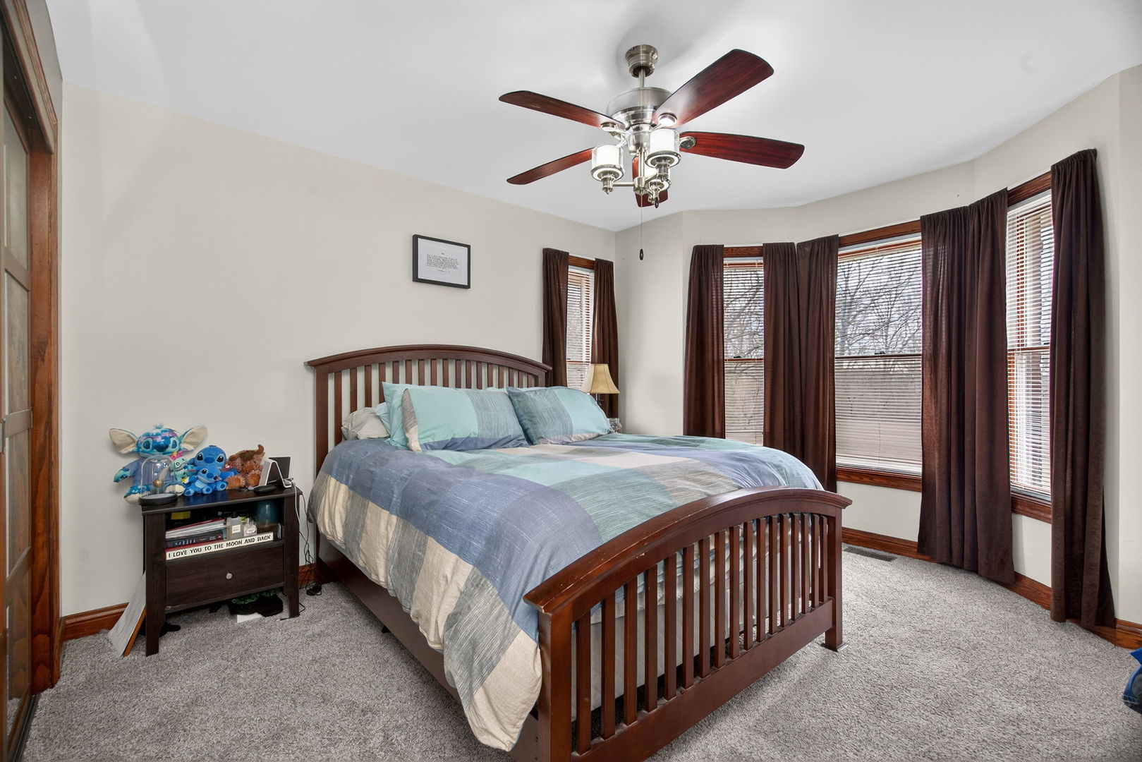 1707 North 2479th Road Ottawa, IL 61350 - Photo 10 of 30 a bedroom with a bed and a chandelier