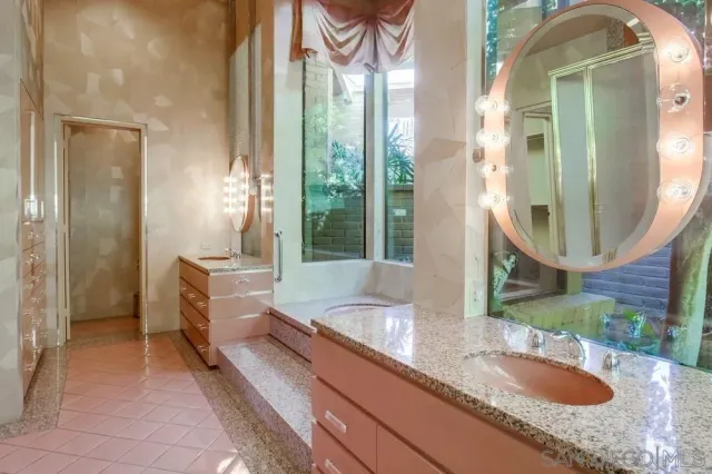 a room with a sink and a window