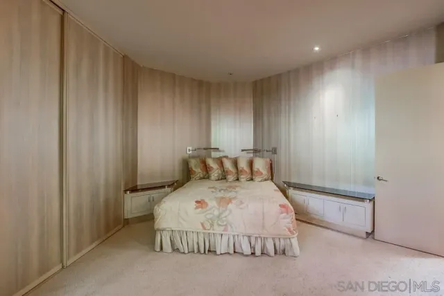 a view of a livingroom with a fireplace a fireplace and window