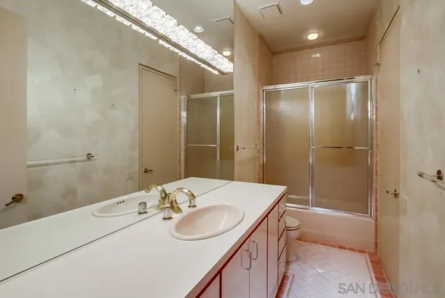 a view of a livingroom with furniture and a window