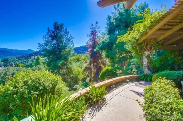 a view of a yard with a garden