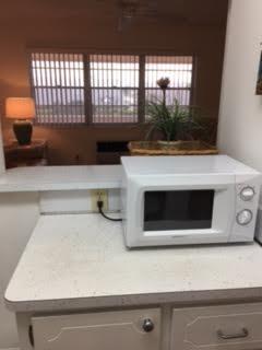 151 Hastings I West Palm Beach, FL 33417 - Photo 8 of 23 KITCHEN AND DINING