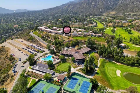 an aerial view of a house having yard
