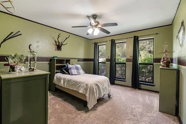 a bathroom with a sink vanity and a mirror