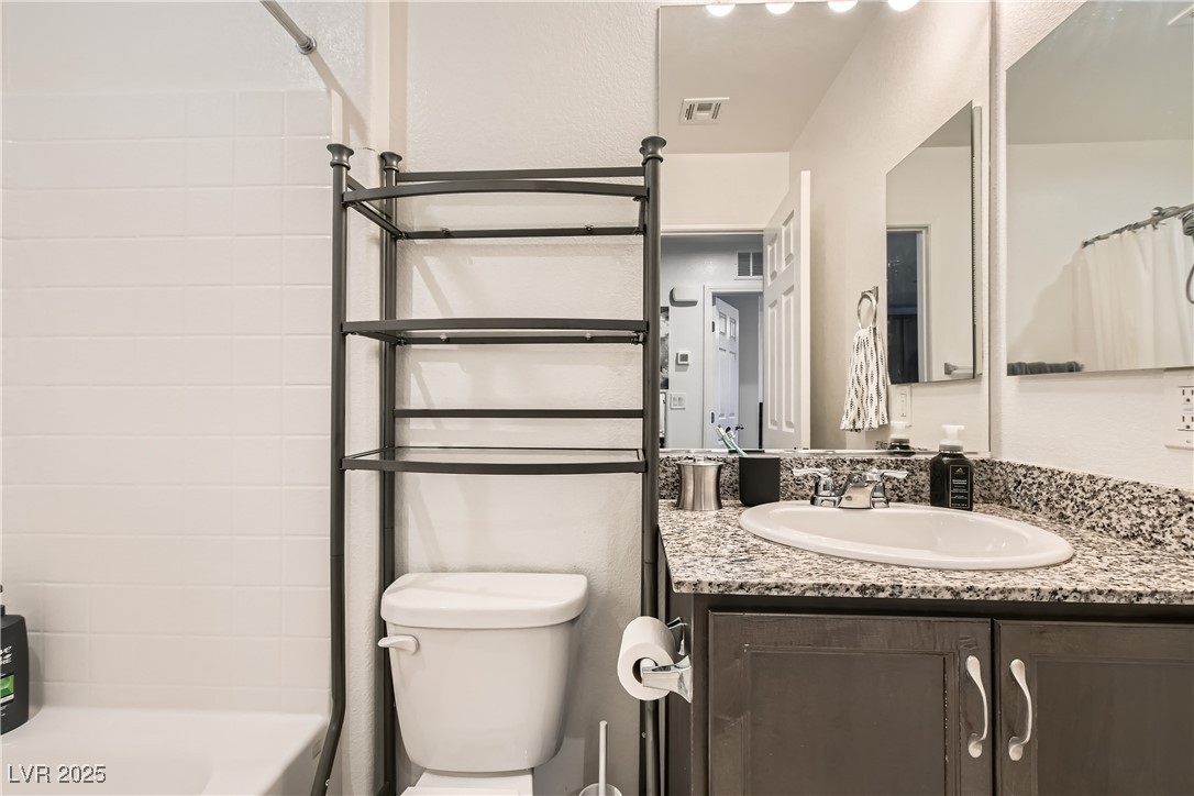 4602 Ingleton Circle Las Vegas, NV 89115 - Photo 4 of 11 Full bathroom featuring shower / bath combo, toile
